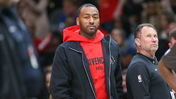 Clippers guard John Wall stares during a timeout.